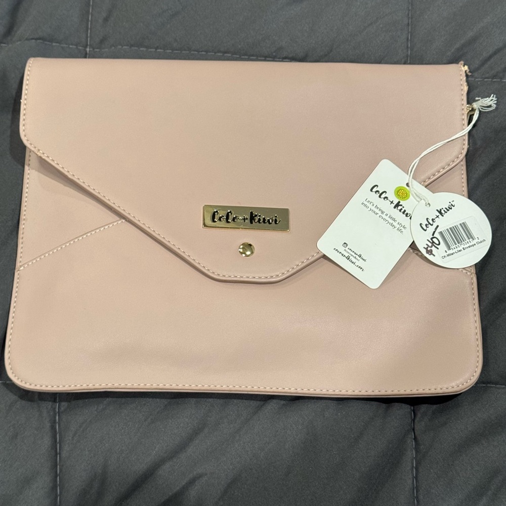 Coco & Kiwi Envelope Purse with crossbody and wristlet strap. NWT blush color